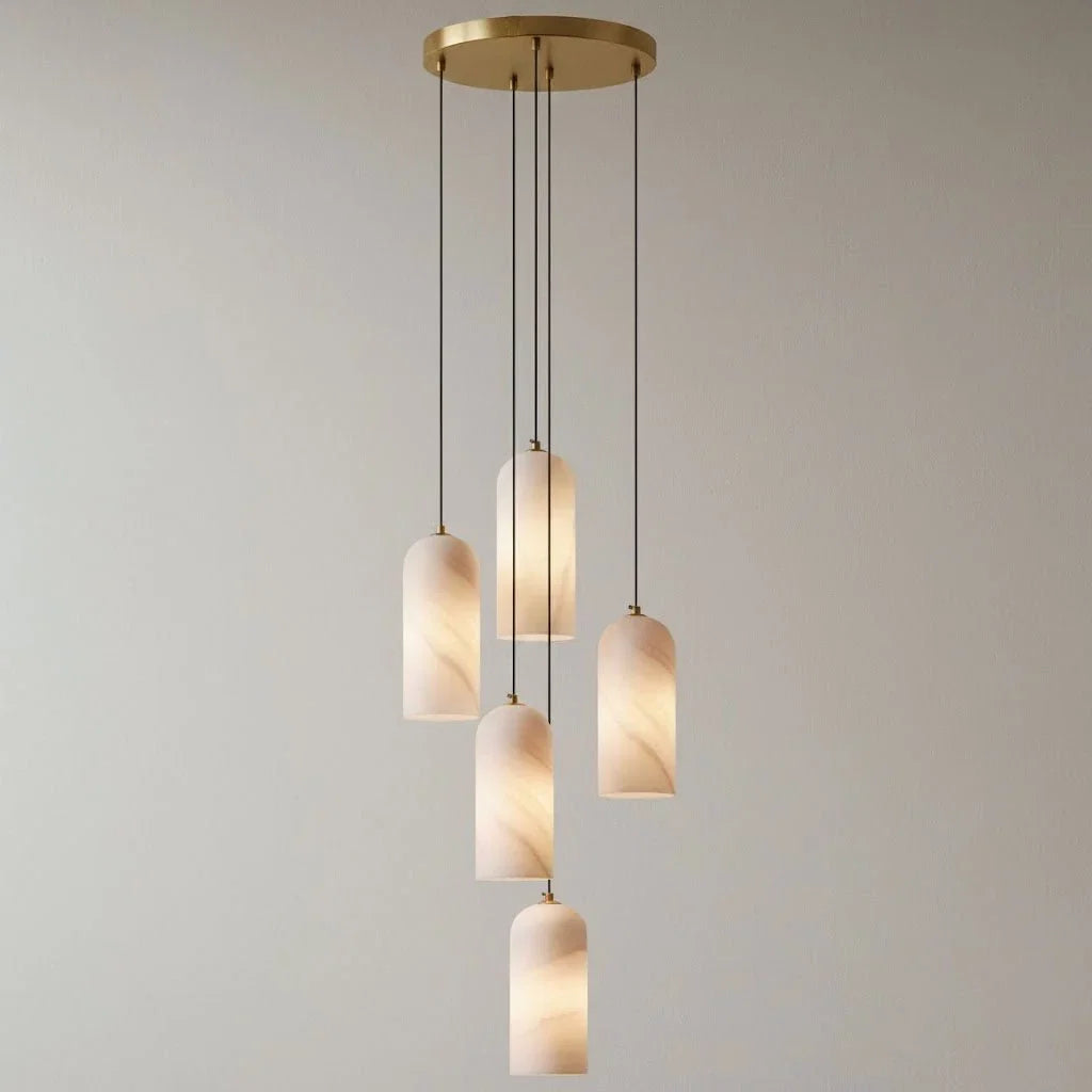 Black metal LED pendant light above a dining table Image