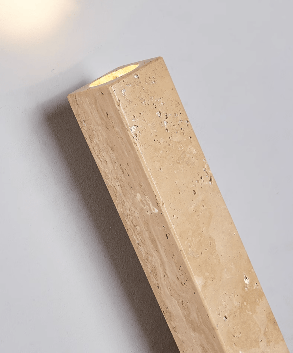 Travertine column wall light with natural wood detail — image 7