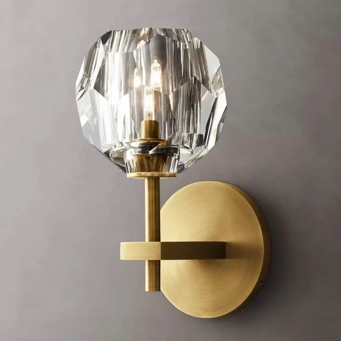 Cristaline wall light in solid brass with cut crystal