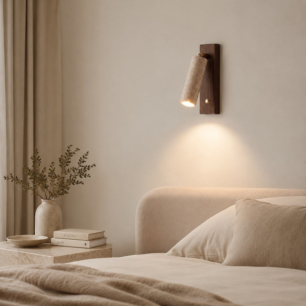 Lumiris cylindrical wall light in yellow travertine and walnut, adjustable LED lighting, modern design for a bedroom.