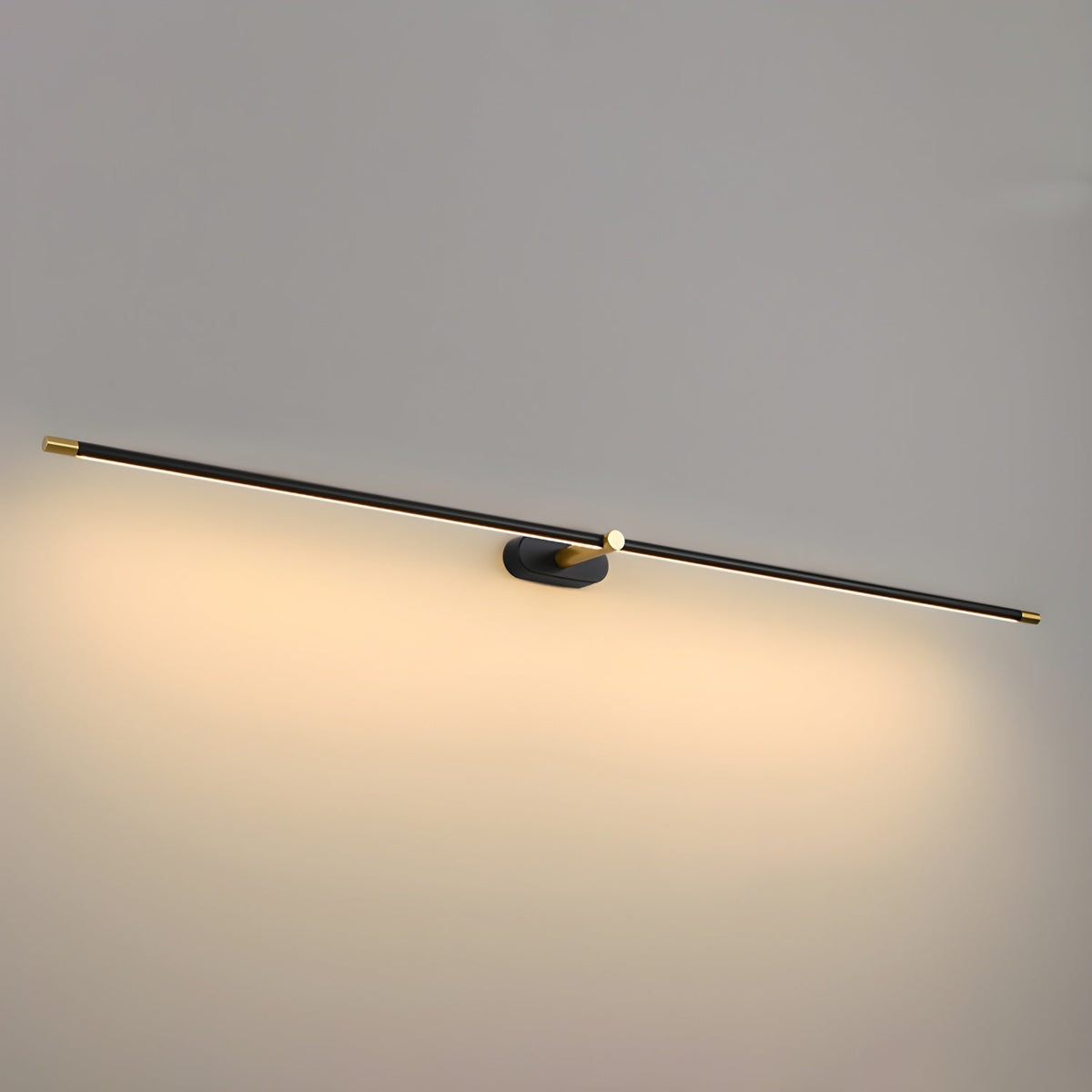 Lumiris modern linear LED wall light in black and gold, warm lighting.