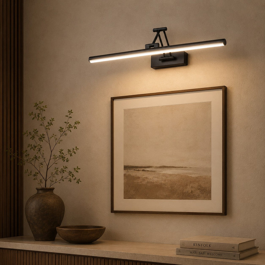 Lumiris adjustable linear wall light in black metal with cool white LED lighting, ideal for a living room or hallway.