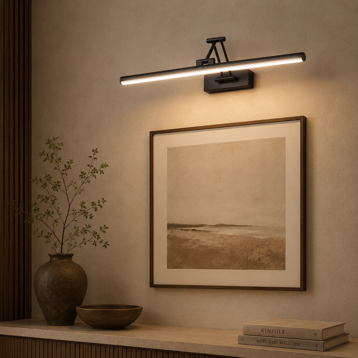 Lumiris adjustable linear wall light in black metal with cool white LED lighting, ideal for a living room or hallway.