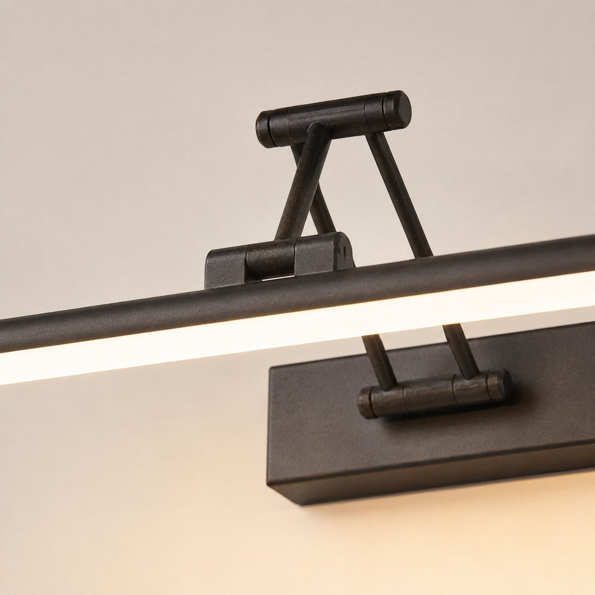 Lumiris adjustable linear wall light in black metal with cool white LED lighting