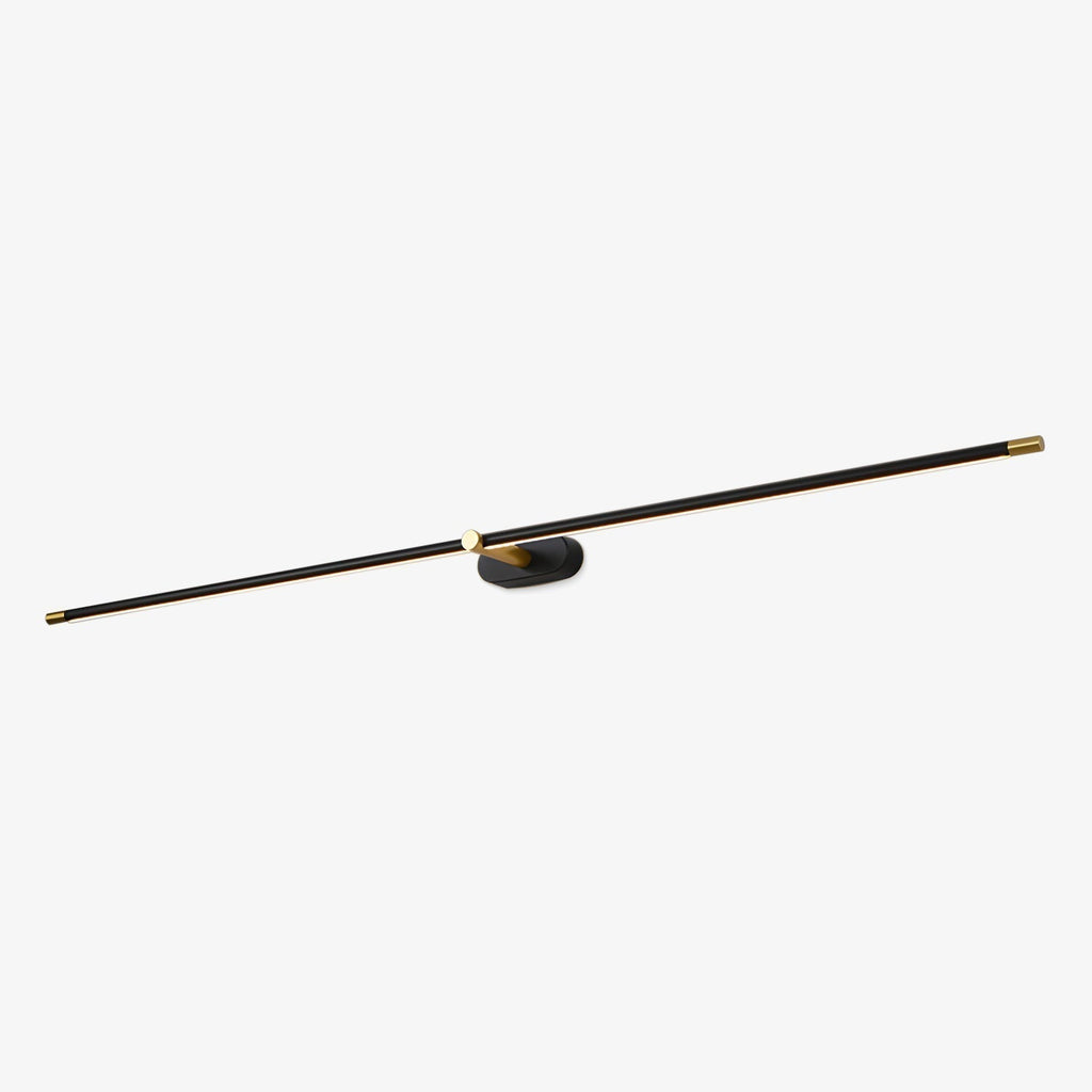 Lumiris modern linear wall light, black with gold detailing, warm lighting.