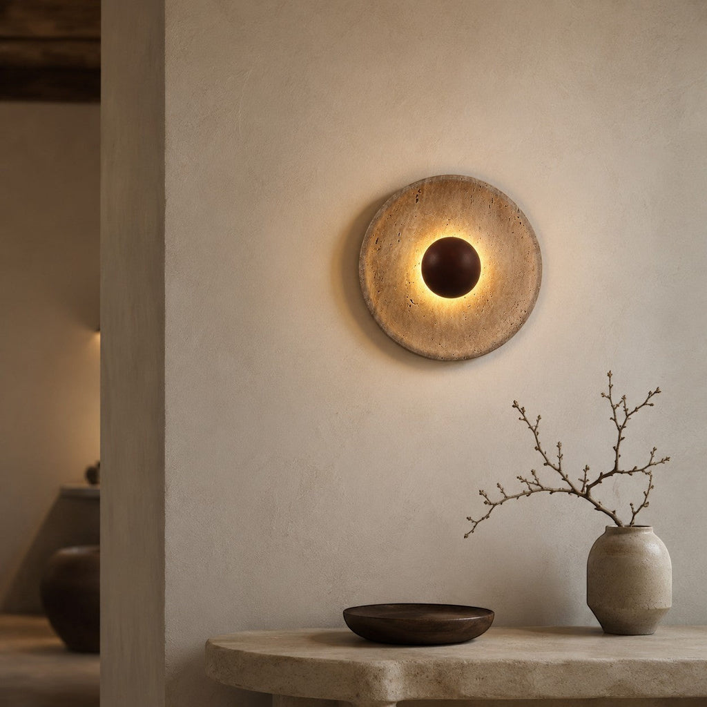 Lumiris sculptural wall light in travertine and wood, soft textured light, artistic design.