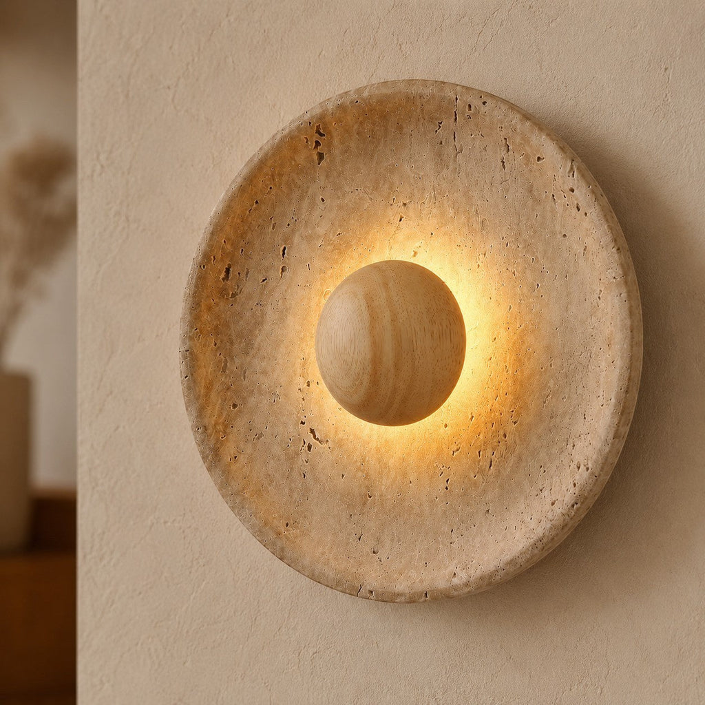 Lumiris wall light in travertine and wood, sculptural design, soft warm light, modern interior decoration.