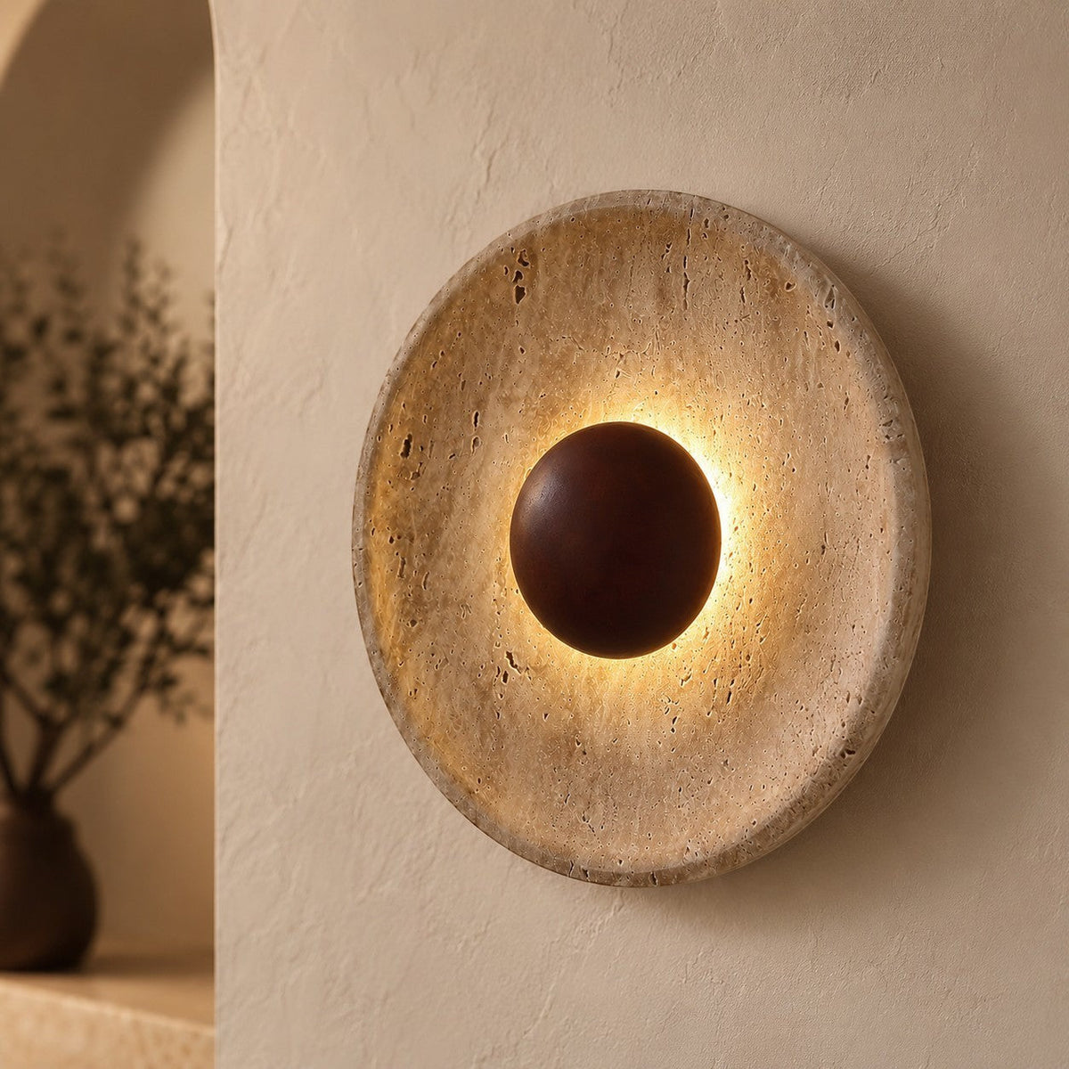 Lumiris sculptural wall light in travertine and wood, warm ambient light, modern design