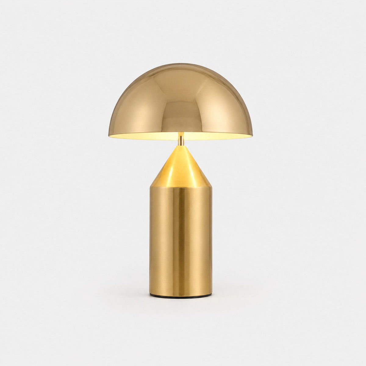 Lumiris mushroom table lamp in gold metal, modern design for a home office or bedroom.