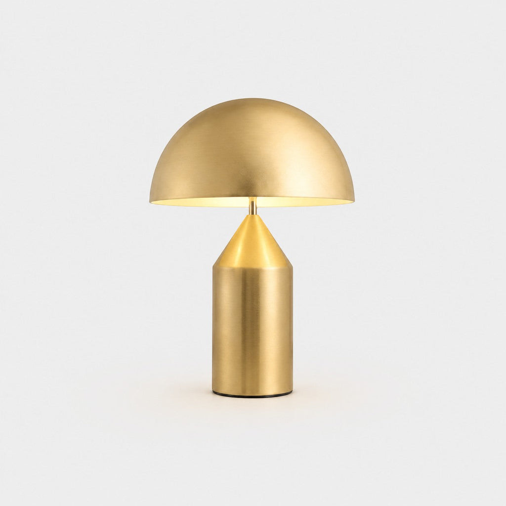 Lumiris mushroom table lamp in gold metal, modern design for a home office or bedroom.
