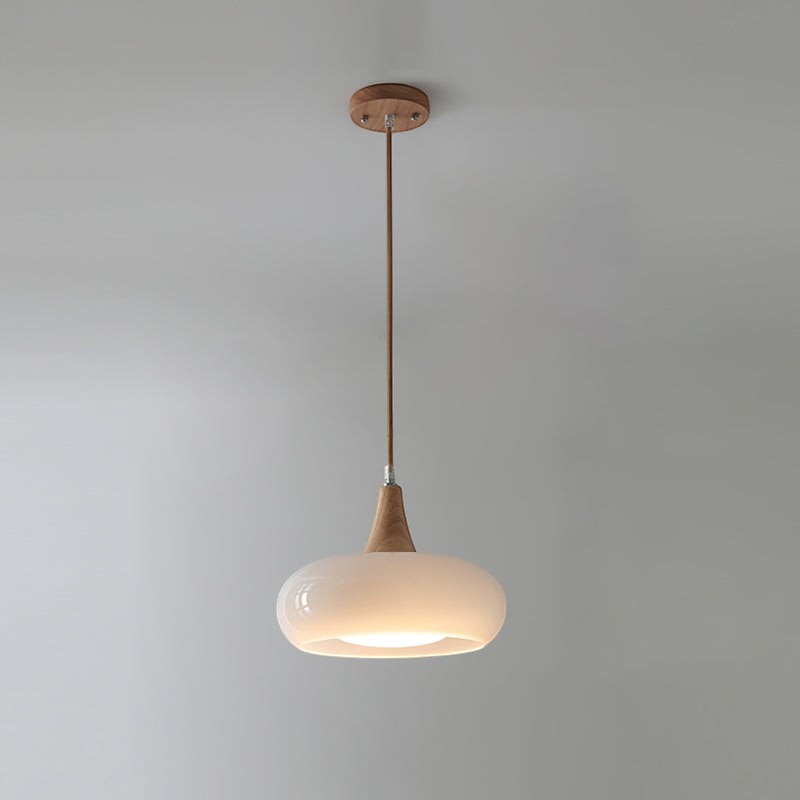Lumiris designer wood and milky white glass pendant light, soft ambient light, modern style for a kitchen or living room.