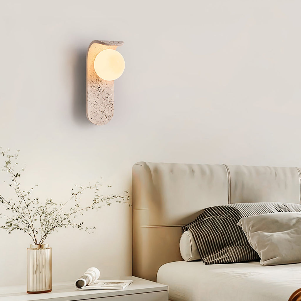 Travertine wall light with an opal glass globe on a curved arm (4)