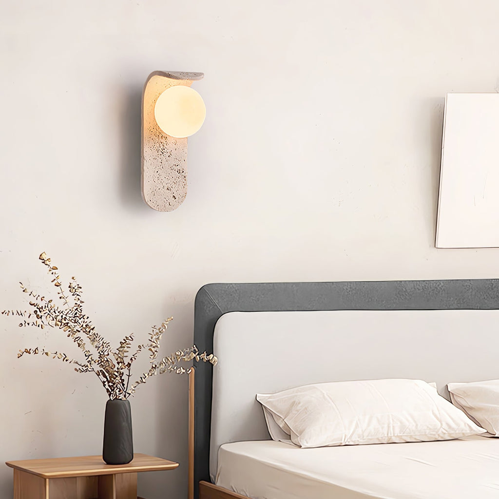 Travertine wall light with an opal glass globe on a curved arm (7)