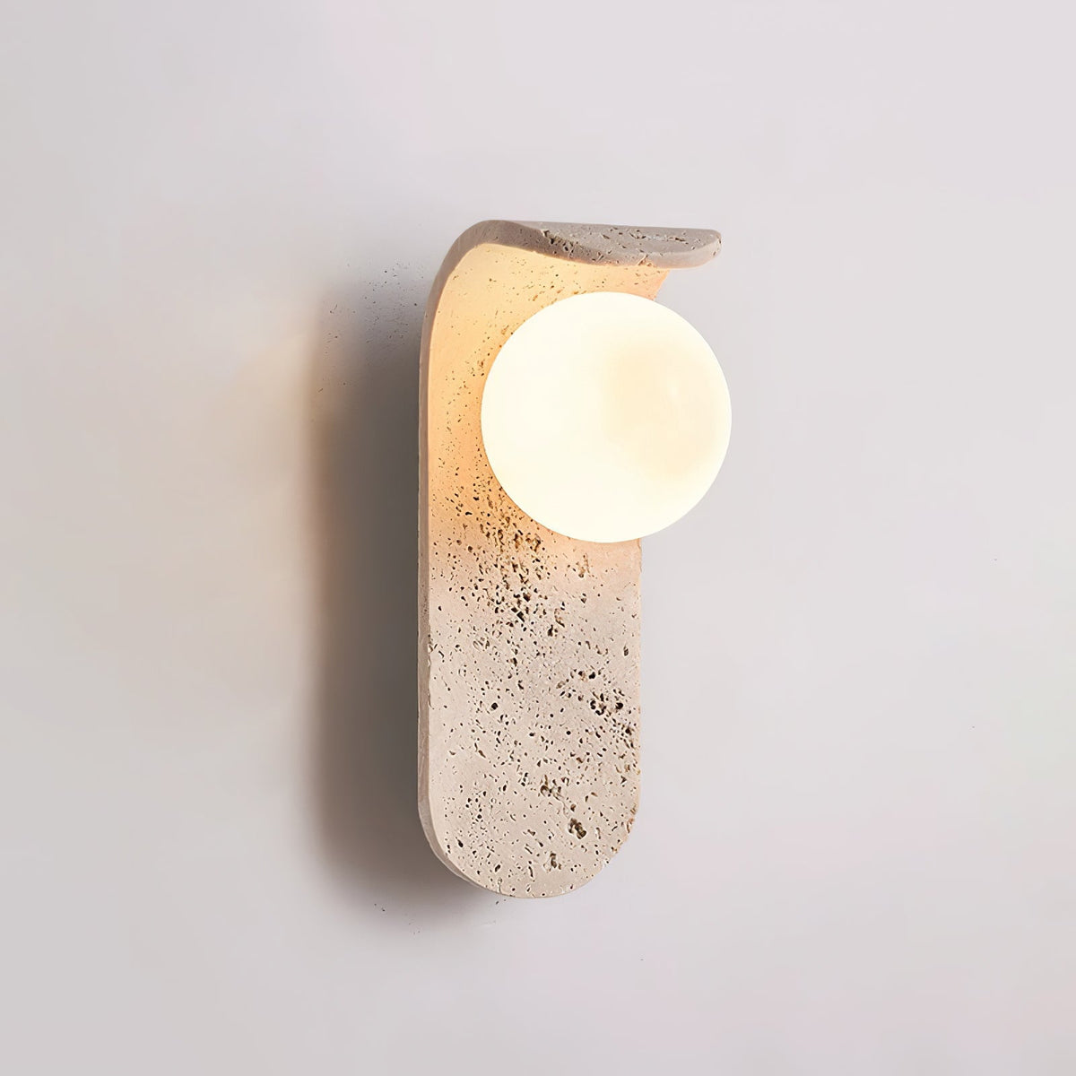Travertine wall light with an opal glass globe on a curved arm (8)