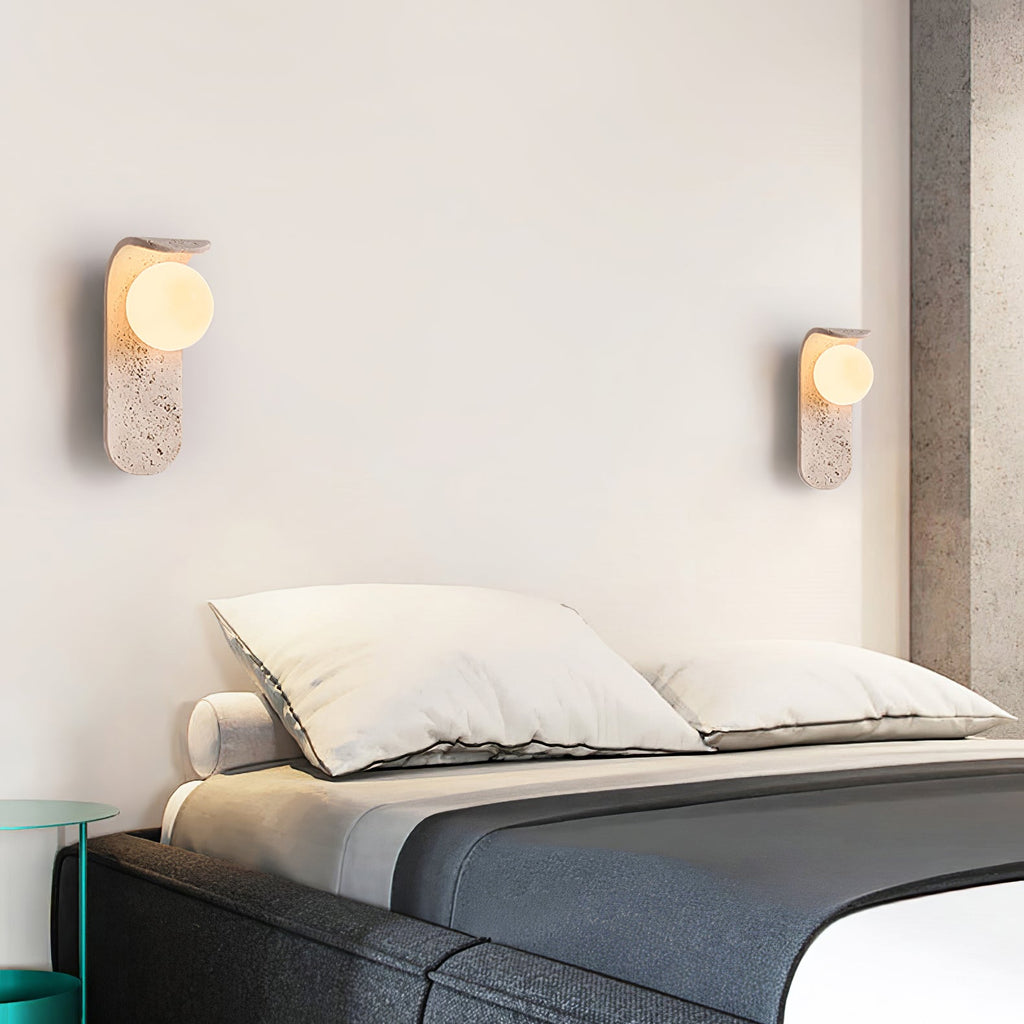 Travertine wall light with an opal glass globe on a curved arm (9)