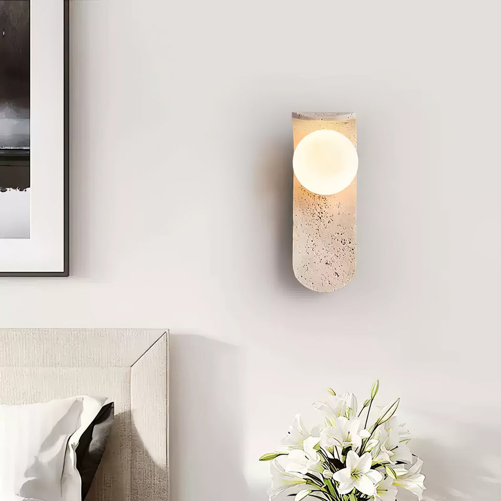 Travertine wall light with an opal glass globe on a curved arm (11)