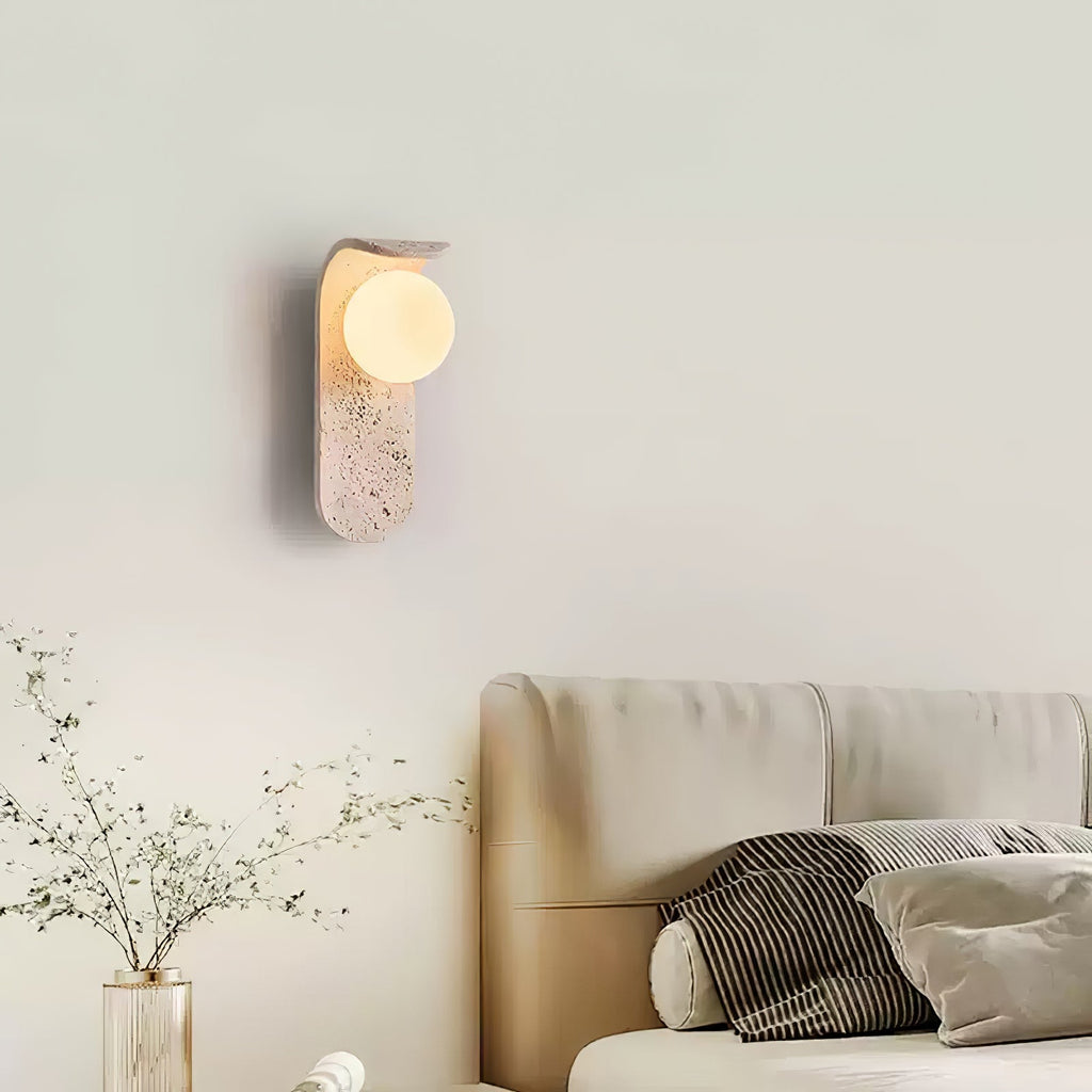 Travertine wall light with an opal glass globe on a curved arm (12)