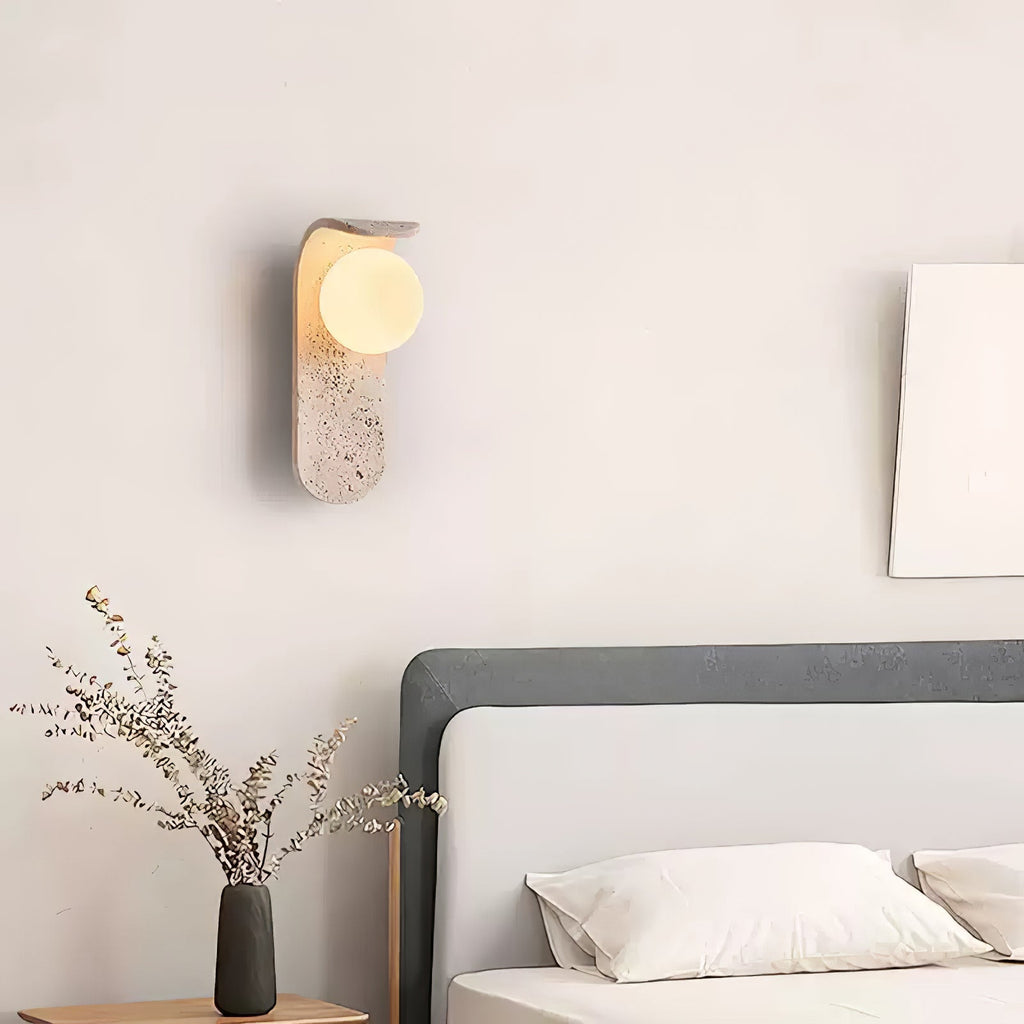 Travertine wall light with an opal glass globe on a curved arm (14)